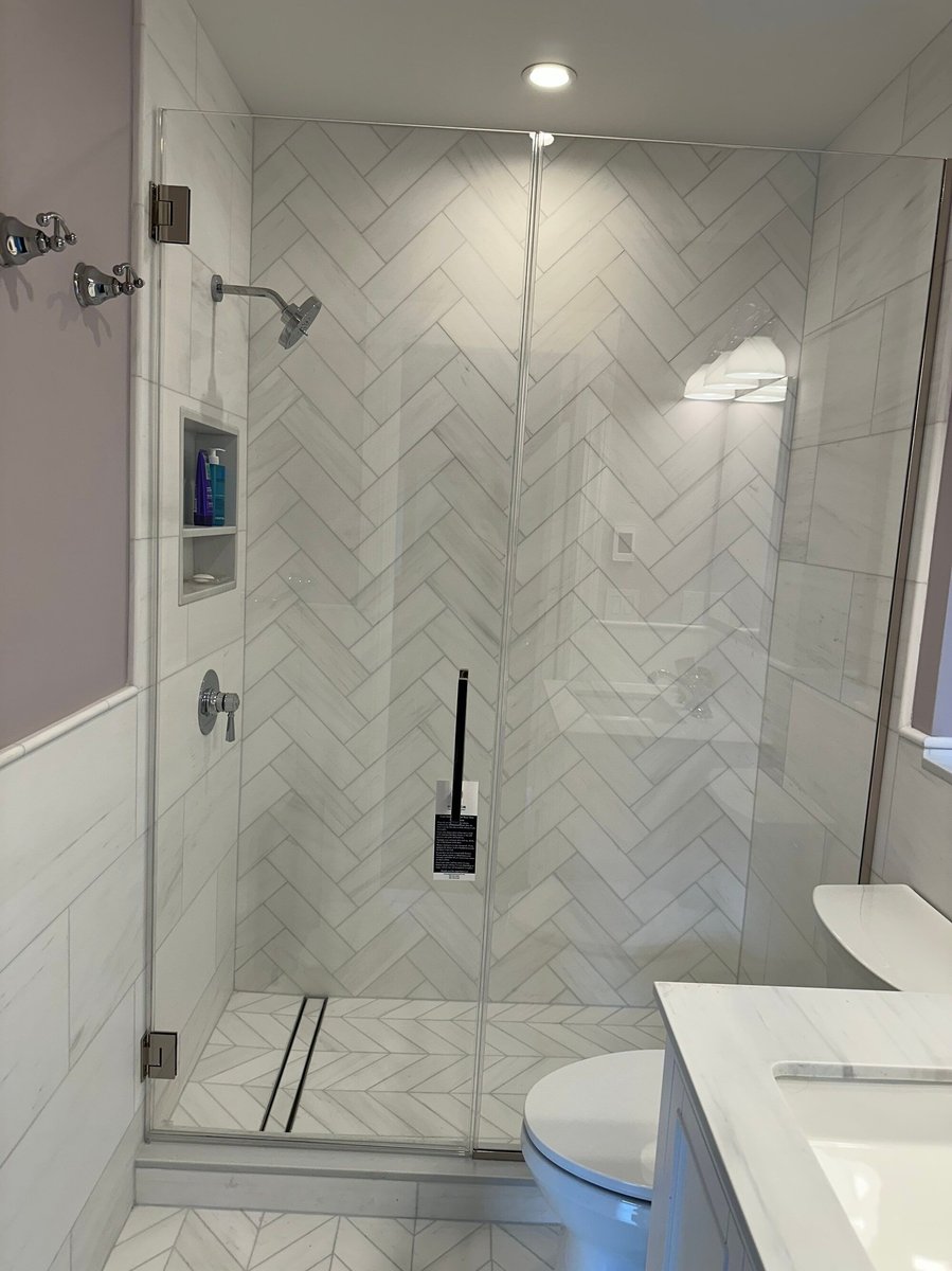 modo renovations bathroom remodeling in manhattan ny close up of glass shower enclosure and tile