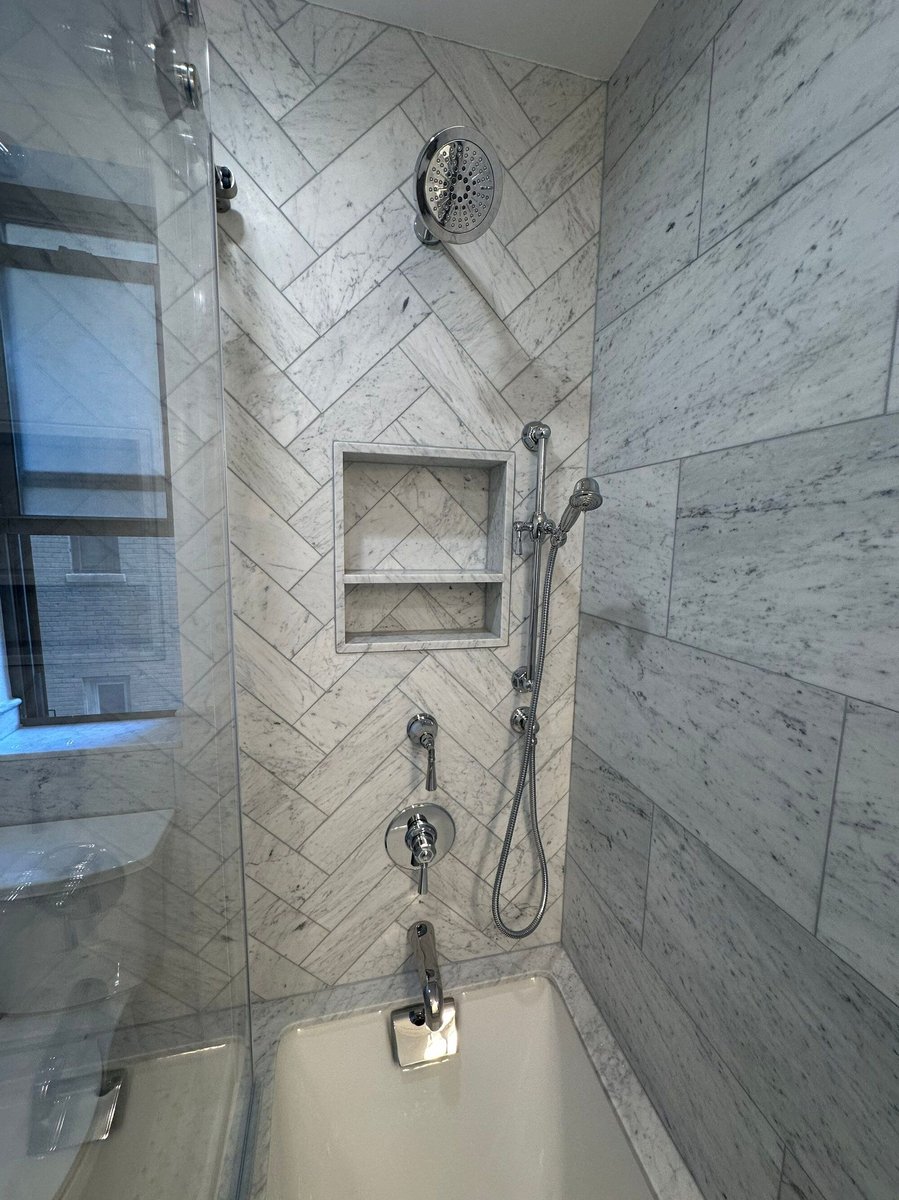 modo renovations bathroom remodeling in manhattan ny shower fixtures on marble herringbone tile wall
