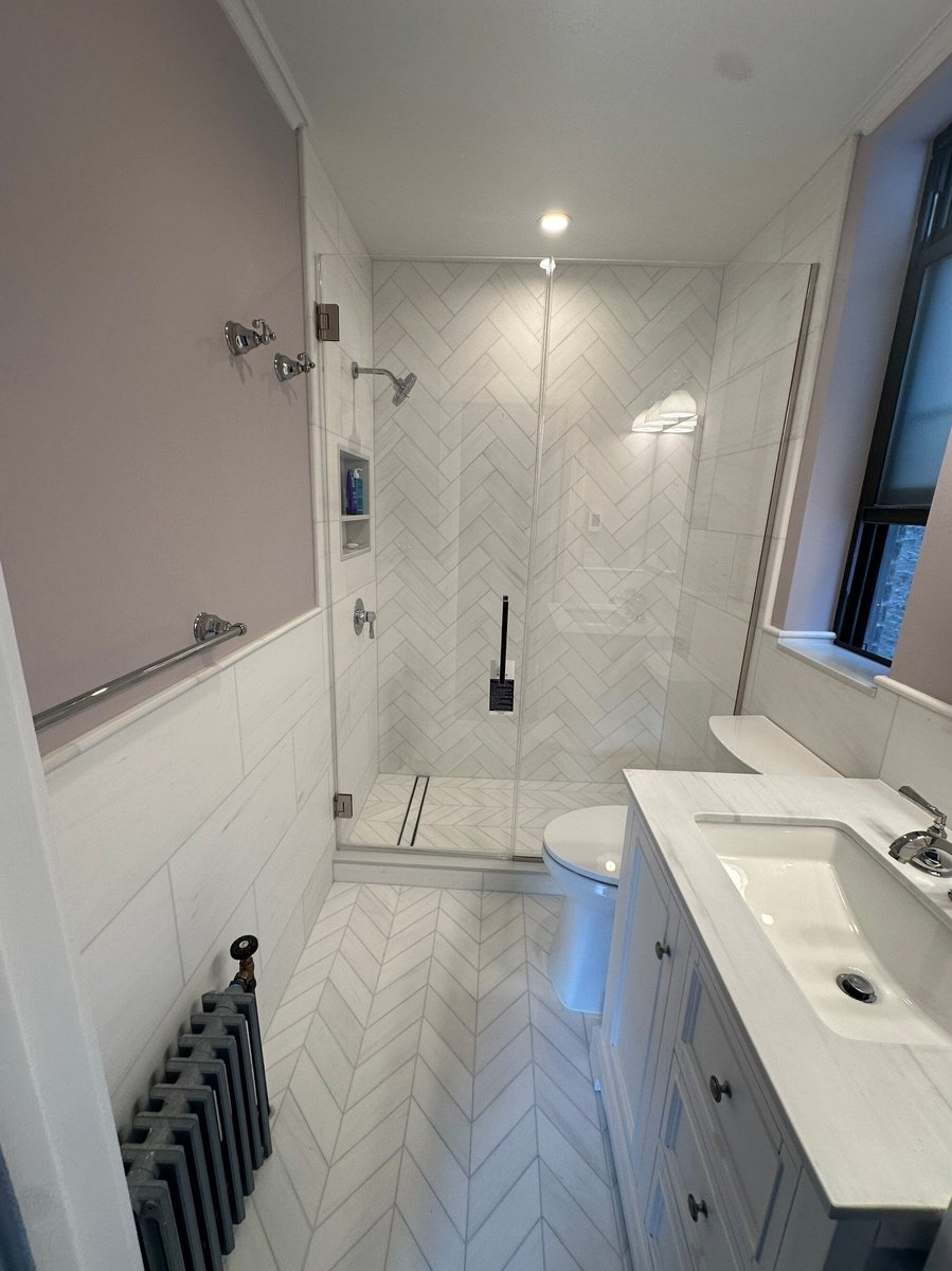 modo renovations bathroom remodeling in manhattan ny with glass shower and herringbone tile flooring
