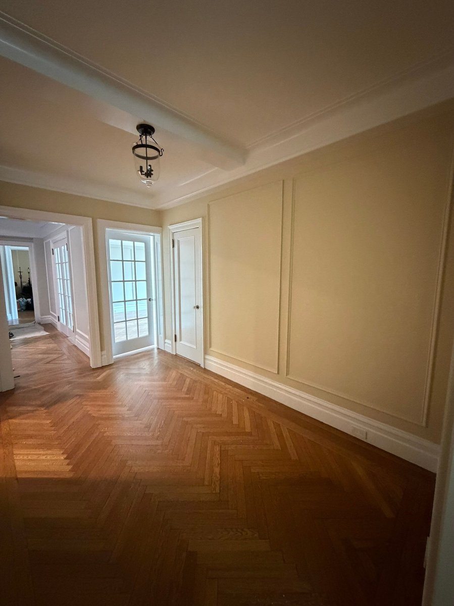 modo renovations home remodeling in manhattan ny room with french doors and herringbone wood floor