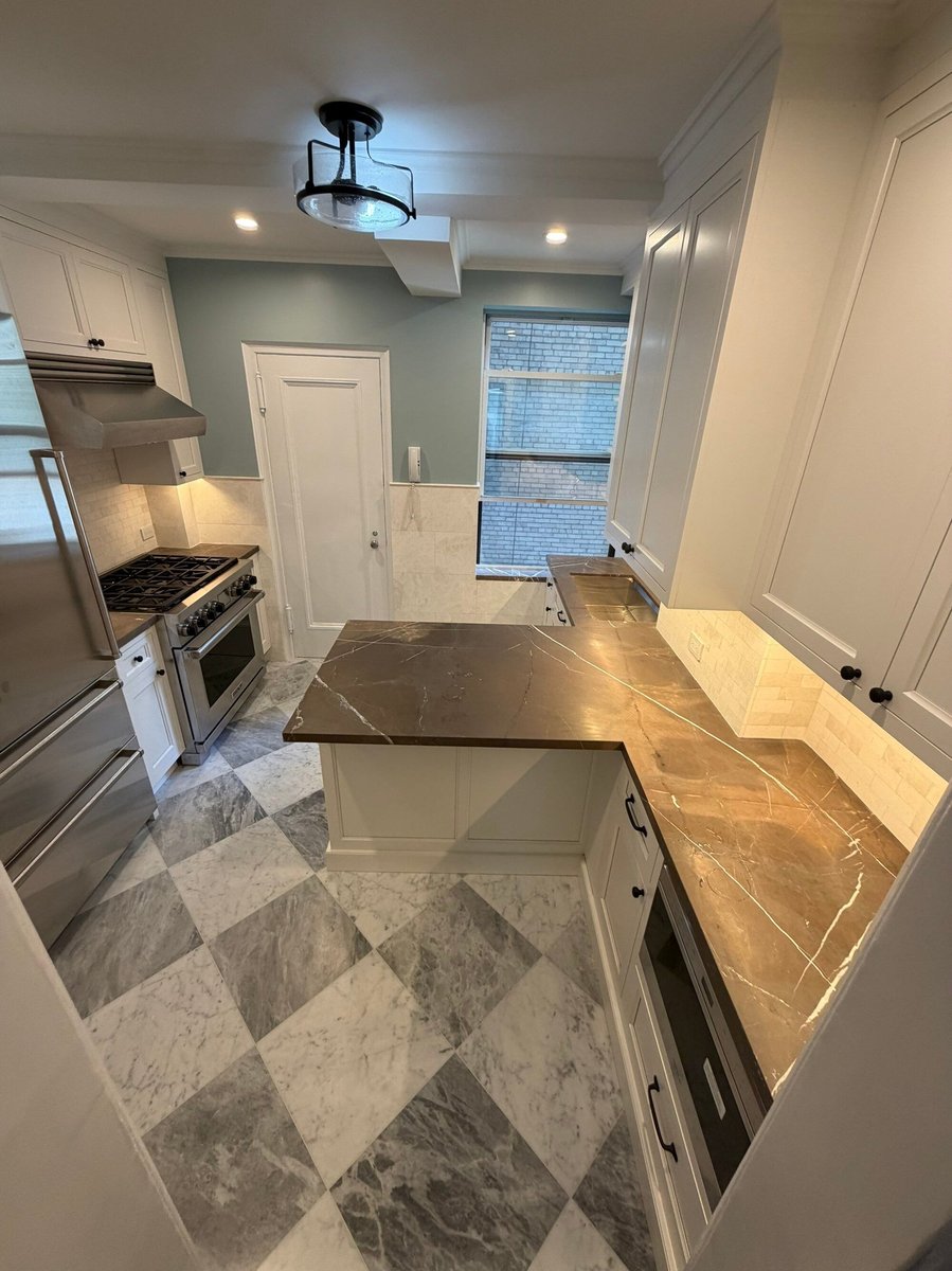 modo renovations kitchen remodeling in manhattan ny with full view of range hood and refrigerator