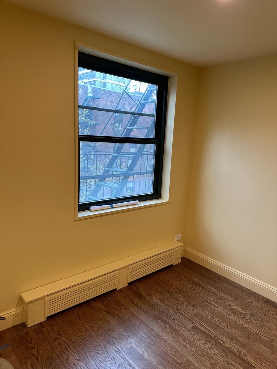 modo-bedroom-fire-escape-window-west-village-nyc-07-optimized