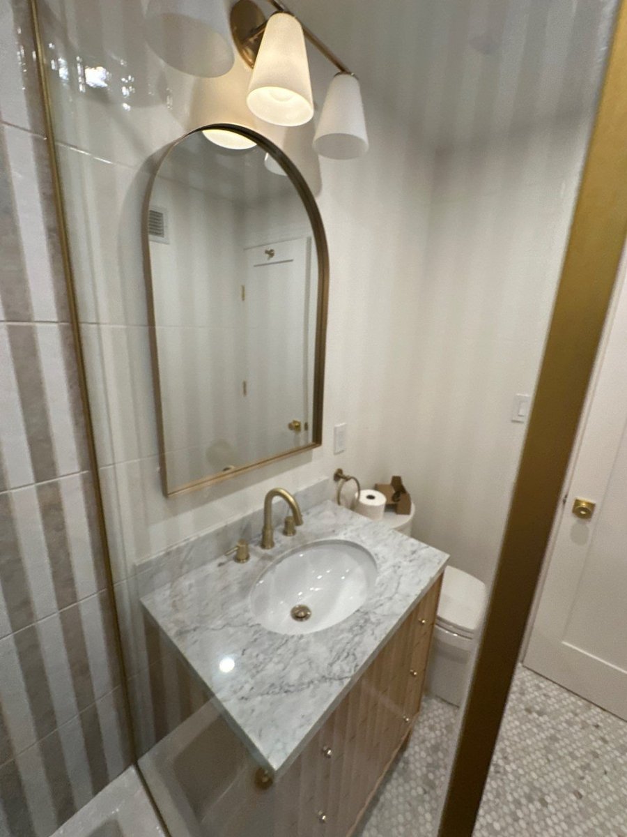 modo-full-bathroom-marble-vanity-arched-mirror-west-village-nyc-104-optimized