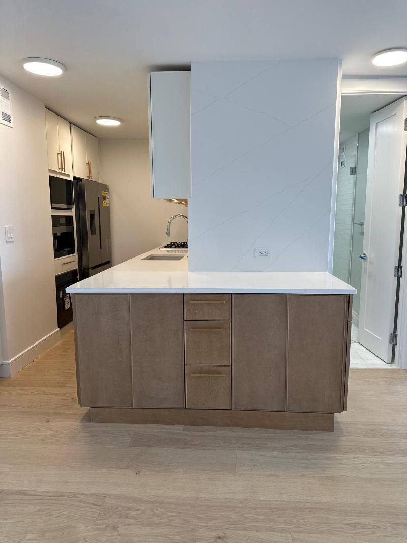 modo-kitchen-waterfall-counter-upper-east-side-nyc-27-optimized