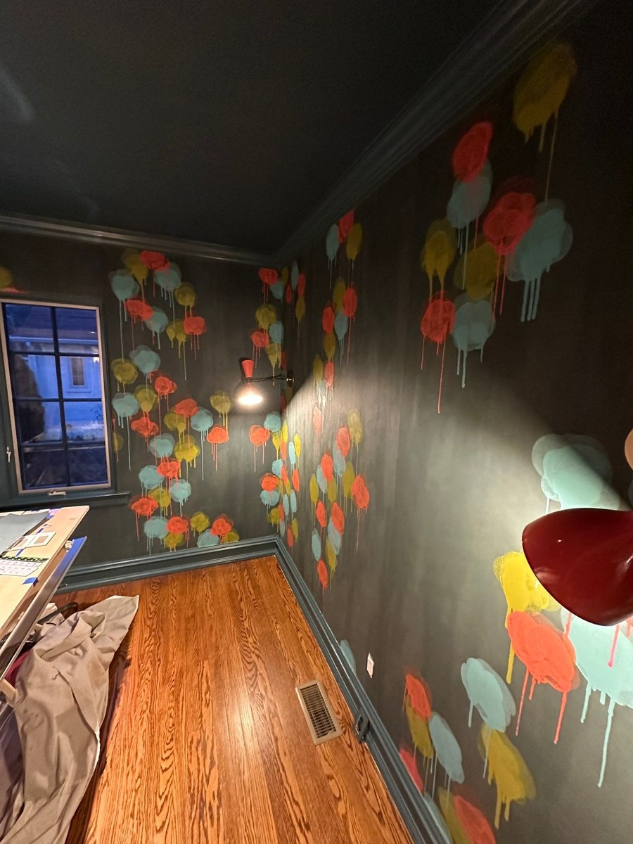 painted accent wall with sconces and wood flooring by modo renovations in rye ny home remodel
